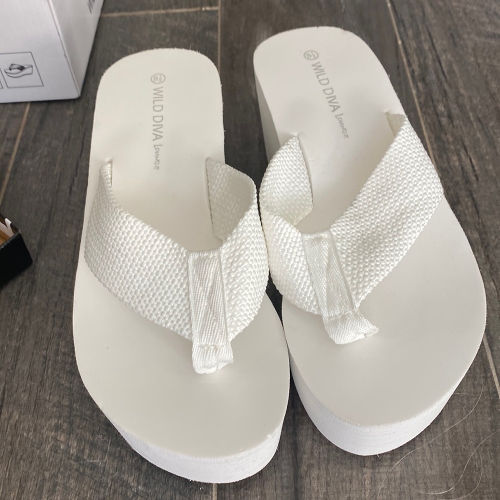 White platform flip flops